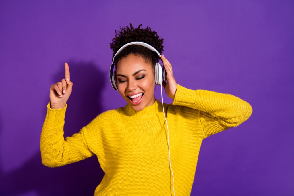 Woman listening to headphones